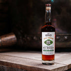 Bottle of Neeley Family Distillery Sweet Thumped Rye Whiskey Over A Wooden Table